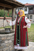 Bulgarian Thracian women's folk costume with caftan, white blouse red skirt geometric trim, BUDJAKFOLK